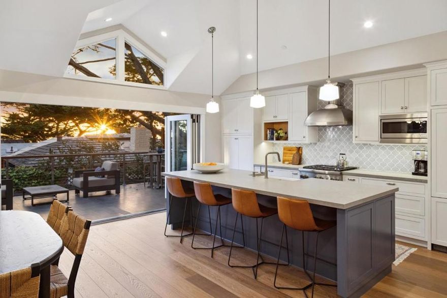 Welcome to Pico by the Sea  an exquisite coastal retreat just 100 steps from the white sands and rhythmic waves of Carmel Beach. Ideally located in the prestigious Golden Rectangle at the NW corner of Carmelo & 12th, this 3BD/2.5BA residence was masterfully reimagined in 2018 to maximize natural light, ocean views, and style. Open the expansive tri fold doors and step onto your private deck to feel the salty breeze and hear the surf. A generous bonus space (excluded from stated square footage) with built-in bunk beds, offers flexibility for guests or additional living space. Thoughtful design and quality finishes create a comfortable, relaxed atmosphere perfect for full-time living or a vacation escape. Spend evenings by the fire, stroll to Carmels renowned shops and restaurants, and immerse yourself in a lifestyle where the ocean is your neighbor. This exceptional home captures the true essence of seaside living; see, smell, and feel the ocean from your very own Carmel retreat.