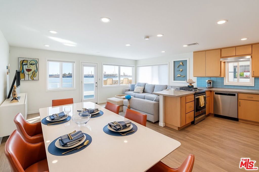 A rare opportunity nestled just steps from the sand at 26 5th Place on coveted Alamitos Beach, this bright 1-bedroom, 1-bathroom retreat offers 863 square feet of breezy coastal living. Airy and bright windows flood the open-concept living area with natural light and frame views of swaying palms and the Pacific beyond. A sleek, modern kitchen complete with quartz countertops, stainless steel appliances, and ample storage flows seamlessly into the living and dining space, making entertaining effortless. The spacious bedroom offers ample closets and storage and easy access to a spa-inspired bathroom, where a glass-enclosed shower and stone-topped vanity evoke seaside serenity. Step outside to your private balcony, ideal for morning coffee or sunset cocktails. Then wander down the gated path to the beach's golden sand. With community laundry, central heat, and one dedicated parking spot, comfort meets convenience at every turn. Experience laid-back Long Beach luxury in this turnkey ocean-view gem.