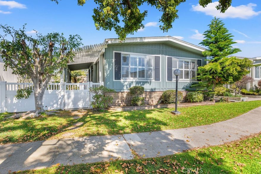 Brighter and more of an open feel with all new appliances. This home awaits your belongings and move in ready. The master bathroom has a newer walk-in-tub. The kitchen is spacious and leads to the roomy dining area with plenty of cabinet space. When you enter the home there is living space on both the left and right side. The laundry room is off of the kitchen with plenty of storage with a door leading to the outside where you have access to your 2 car enclosed garage. The Groves community offers amenities galore, Clubhouse with a kitchen, community park, putting green, lawn bowling, Pickleball, bouchée ball, tennis courts, ceramic studio, wood shop area, pool & spa, garden plots, dog park, lounge area, poker room & library, gym, outdoor entertaining area, recreation room, car wash, RV parking with dedicated dump station.
