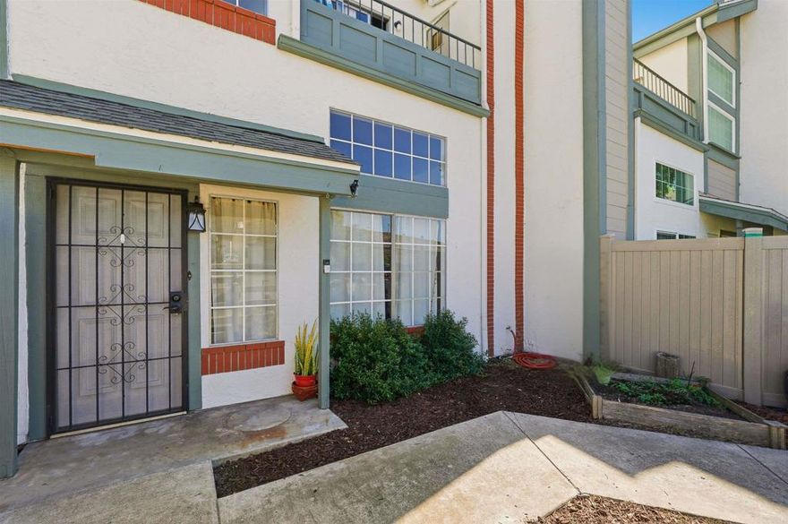 Updated 3BD/2.5BA + Bonus Space in Gated Community! This bright tri-level townhome features a newly updated kitchen, brand-new A/C, and in-unit washer/dryer. Enjoy a private front and back yard, plus a balcony off of the primary suite. Detached 1-car garage and assigned parking included. Community amenities include a pool, spa, dog park, and clubhouse. Conveniently located near 125 freeway access. HOA covers water, trash, and sewer, making this home as practical as it is comfortable.