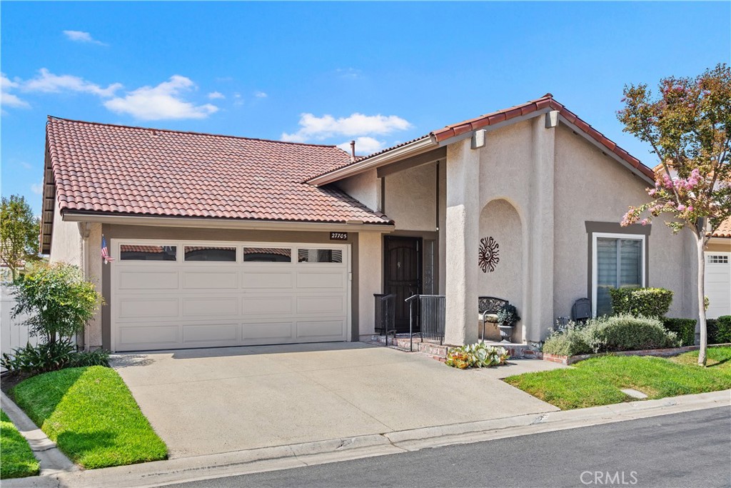 JUST LISTED IN THE GATE-GUARDED SENIOR COMMUNITY OF CASTA DEL SOL! This remodeled Casa Narciso model home offers a 2 bed+den, 2 bath floorplan with nearly 1,500 sqft of interior living space. Features include full copper RE-PIPING, updated Lennox HVAC, dual-pane windows & sliders throughout and a GORGEOUS OPEN KITCHEN with granite countertops, designer backsplash, large peninsula with breakfast bar, stainless steel appliances, and custom hardwood cabinetry. The cabinets & countertop were extended along the full wall in to the formal dining area and include added electrical outlets and attractive under-counter indirect lighting. The home also features TRAVERTINE stone flooring, an updated RHEEM premium water heater, INSIDE FULL-SIZE LAUNDRY and twin skylights added with permits for tons of NATURAL LIGHT. The master bedroom sits quietly at the back of the home away from the street and features a cathedral ceiling with cooling fan, dual closets, and an en-suite bath with dual-sink granite countertop vanity and remodeled step-in shower. The guest bedroom & den are just off the front entry and sit next to the guest bathroom, which has also been updated with granite countertop vanity and step-in shower. Other features include a gas/wood burning fireplace, large 2-car direct-access garage with pull-down attic access ladder, whole-house water filtration system, and an added slider at dining area for access to the wrap-around back patio. The covered patio includes privacy hedge & ceiling fan and extends to the over-sized gated side yard, which stretches the full-length of the home. This home also includes full membership to the MISSION VIEJO LAKE, access to all of the Casta del Sol community amenities, and is located conveniently within walking distance to the main clubhouse and Oso Creek golf course.