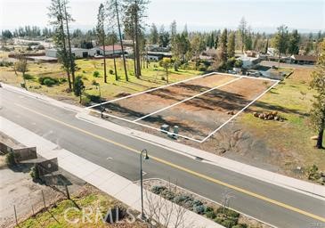 Prime Development Opportunity in the Heart of Downtown Paradise!
Seize this rare chance to own one of the largest available Central Business (CB) zoned parcels in the thriving Downtown District of Paradise! These nearly flat, equally sized lots are being sold together, offering approximately 110 feet of Almond Street frontage—a prime location surrounded by well-established businesses.
With CB zoning, the possibilities are endless—whether you envision a restaurant, retail shop, office space, or mixed-use development, this central location is ideal. Just a short walk from the popular Train Depot Park, which hosts farmers markets, concerts, and community events, your business will benefit from a steady flow of foot traffic.
Nearby businesses include Starbucks, Les Schwab, popular restaurants, and more, adding to the vibrancy of this sought-after area. Sidewalks, streetlights, and small-town charm make this a fantastic investment for those looking to build in a community-focused town with a bright future.
Don’t miss out—explore this exceptional opportunity today and bring your business vision to life in beautiful Paradise!