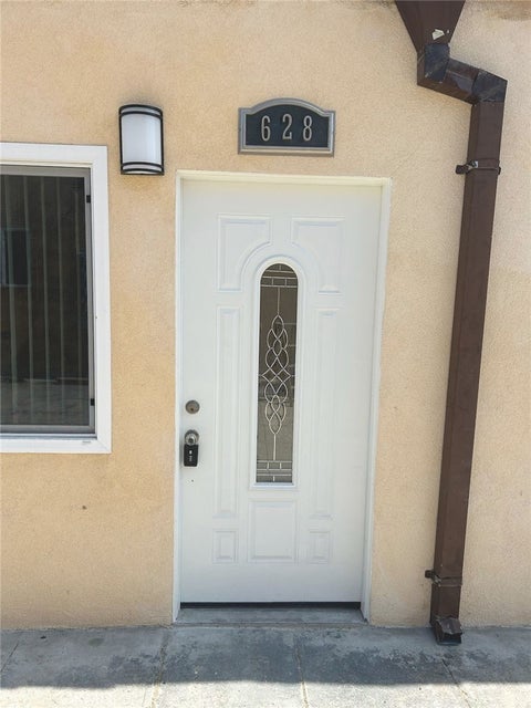 Photo of 628 W 59th Place, Los Angeles, CA 90044 (MLS # CV26170015)