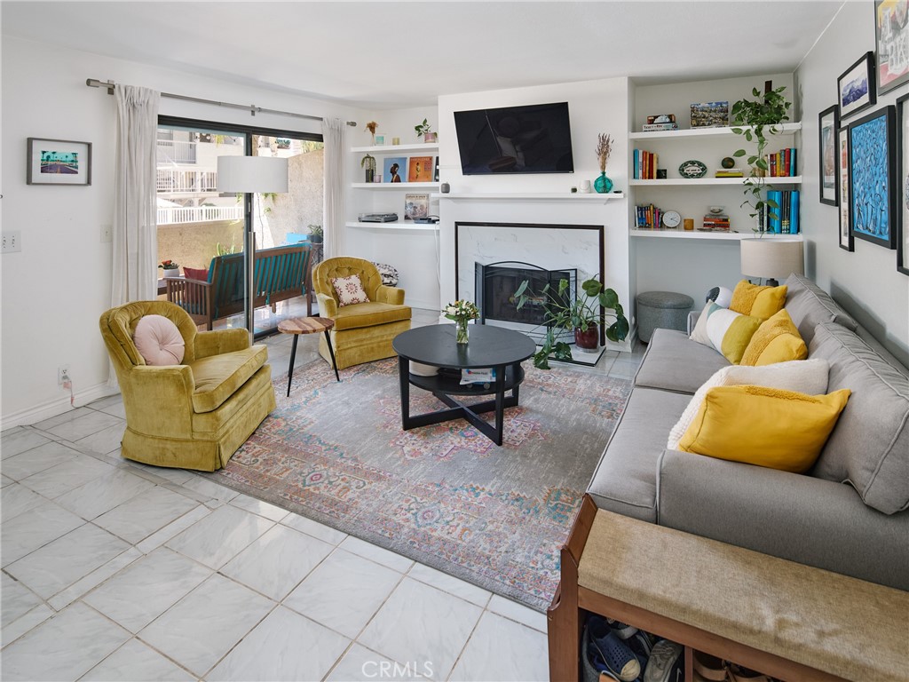Welcome to your new home at 400 W 223rd St #107, Carson, CA, where comfort and convenience blend seamlessly in this charming 989 square foot condo. This inviting residence features two spacious bedrooms and two well-appointed bathrooms, offering ample space for relaxation and privacy. This unit is wonderfully placed toward the rear of the complex, a good distance away from any street noise. Step inside to discover the elegant recessed lighting that beautifully illuminates the open-concept living area, creating a warm and welcoming atmosphere. The neat kitchen is designed for both functionality and style, perfect for preparing meals and entertaining guests. Enjoy the luxury of having a washer and dryer conveniently located in your unit, making laundry days a breeze. Additional storage is a key highlight, with both a storage shed and available storage options to keep your belongings organized and accessible. Take advantage of the communal amenities, including a sparkling pool and a soothing hot tub, providing the perfect spots to unwind and socialize with neighbors. The common outdoor space offers a serene setting for outdoor gatherings or a peaceful retreat for quiet reflection. Safety is prioritized with a security gate, ensuring peace of mind and a secure environment for you and your loved ones. This delightful condo offers a wonderful opportunity to live in a vibrant community with all the comforts of home. Don’t miss out on the chance to make this your new sanctuary. Schedule a viewing today and experience the best of Carson living!