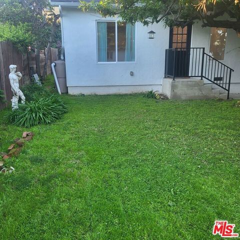 Photo of 10829 W Woodbine Street, Los Angeles, CA 90034 (MLS # 26831609)