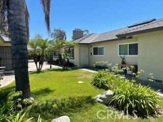 Discover the comfort and convenience of this beautifully remodeled 2-bedroom, 1-bathroom ground floor apartment located in an 8-unit garden-style complex directly across from the Westfield Shopping Center in Arcadia. Within the prestigious Arcadia School District, this home features a spacious living room with a cozy fireplace and an open kitchen to the living room with a counter, newer cabinets, granite countertops, and a generous pantry. The newly remodeled bathroom includes dual sinks and a walk-in shower. Additional amenities include central air and heat, a community laundry room, and a 1-car carport. One-year minimum lease required; no pets & no smoking policy.