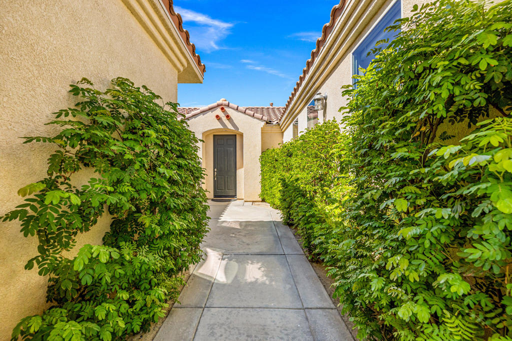 Welcome to The Desert Collection, a gated retreat nestled in the highly desirable area of North Indio--where style, space, and sunshine seamlessly come together. This charming single-story home features 3 bedrooms and 2.5 bathrooms, along with a spacious living room complete with a cozy fireplace, a dedicated dining area, and a functional kitchen with a peninsula ideal for casual meals or entertaining. Enjoy abundant natural light throughout, with brand new carpeting, fresh interior paint throughout the entire home, and new window treatments adding a modern, move-in-ready touch. Step outside to a private backyard perfect for relaxing or outdoor gatherings, and take advantage of the attached 3-car garage for extra storage and convenience. With low HOA dues, no Mello-Roos tax, and The Golf Club at Terra Lago just minutes away, this home offers both comfort and value in one of North Indio's most sought-after communities. (Some photos have been virtually staged).