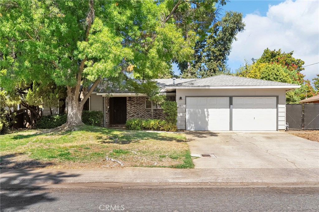 Welcome to this charming, spacious 3-bedroom, 2-bath home nestled in a wonderful Chico neighborhood, just minutes from Bidwell Park, Sierra View Elementary, and Pleasant Valley High School. Step inside to find beautiful, engineered hardwood floors that flow throughout the home. The kitchen has been refreshed with freshly painted cabinets, adding a bright and cheerful touch to your cooking space, with black stainless appliances and a spacious dining area making this a perfect place to entertain. The living area is large and has a wood-burning stove to make this a cozy retreat in the cooler Chico months. Outside, you’ll appreciate the convenience of RV/boat parking along the side of the home, plus a 2-car garage and backyard shed for all your storage needs. With its prime location and desirable features, this home offers comfort, functionality, and a lifestyle you’ll love. This is one you don’t want to miss! Swing by one of the open houses or call and schedule a private showing today!