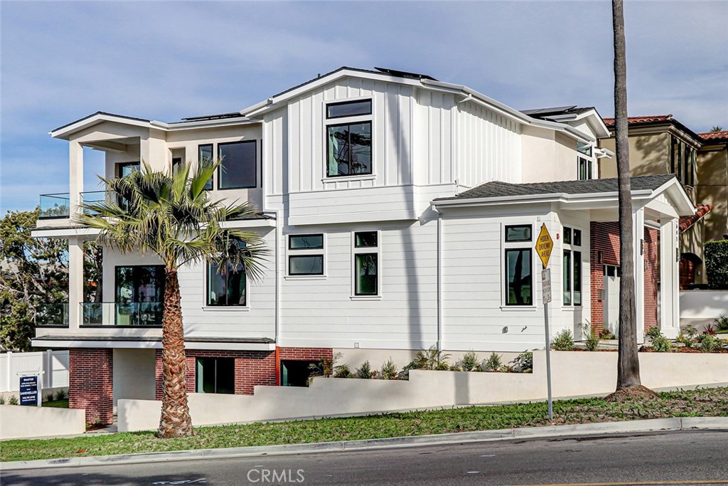 In South Redondo Beach, where the Pacific meets a world of effortless luxury, a home has arrived that defines modern coastal living. Completed in February 2025, this newly constructed sanctuary blends cutting-edge technology with the timeless appeal of sun-drenched elegance. Just minutes from the ocean, its design captures the essence of what SoCal living should be: effortless, sophisticated, and always connected.
This five-bedroom, five-and-a-half-bath masterpiece is more than just a house—it’s an experience. Ocean views span two levels, with pocket glass walls that invite the sea breeze into open, sunlit spaces. A seamless blend of indoor-outdoor living is achieved with ocean view decks and multiple dining areas, ensuring that every gathering—whether intimate or grand—feels like a celebration of the California coast.
This home is more than beautiful. It’s brilliant. A complete solar panel system with battery-ready integration keeps the lights on and the energy bills down. The inverter has been installed with 25 solar panels ensuring maximum efficiency. The three-stop elevator ensures accessibility, while state-of-the-art smart features extend from the kitchen to the showerhead—yes, even your morning rinse can be voice-controlled to the perfect temperature.
The kitchen is a chef’s reverie, boasting top-of-the-line Thermador appliances, two dishwashers—including a multi-drawer unit—a butler’s pantry, and a beverage center. Oak hardwood floors run throughout, leading to fireplaces in the living area and primary suite, adding warmth at the touch of a button. Every detail has been considered, every finish perfected.
And then there’s the ADU. With its own separate entrance, full kitchen, and living space, this one-bedroom, one-bath retreat offers possibilities as boundless as the terraced side yard—whether for extended family, guests, a sophisticated home office, or as an upscale rental opportunity.
South Redondo Beach has always been a coveted address, but homes like this elevate it further. Just a stone’s throw from world-class dining, boutique shopping, and some of the best schools in LA County, this residence is as much an investment in lifestyle as it is in real estate.
Because the future of home isn’t just about where you live—it’s about how you live. And here, in this remarkable slice of coastal paradise, the future is waiting.