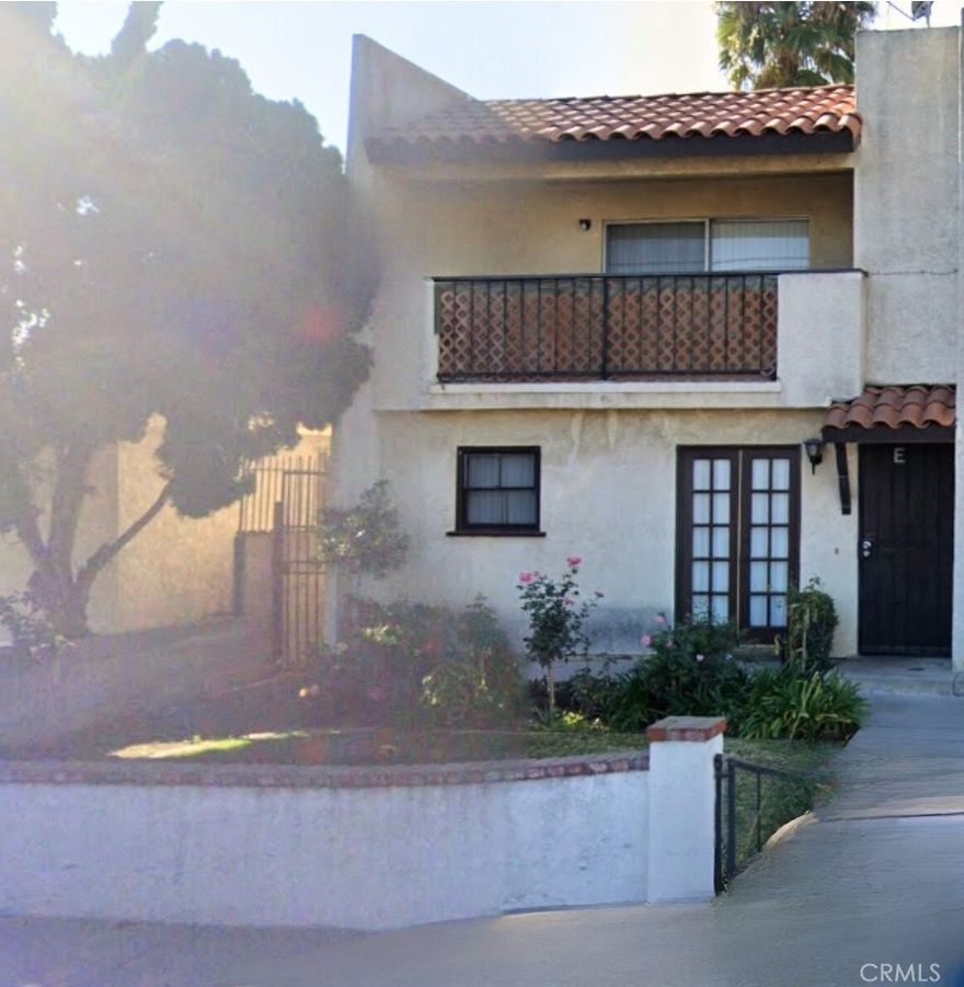 Motivated seller!!! Great starter home in need of a little TLC!!! Just a short drive away from shops and freeway. Front corner unit, sharing 1 common wall with central air system. Kitchen dining room, living room and 1/2 bathroom located on the lower level. Living room features a beautiful free-standing fireplace. Remaining rooms and full bathroom located in the upper level. Spacious master bedroom features sliding closet doors with balcony. Property also has 2 car garage with direct access to unit with washer and dryer hookups.