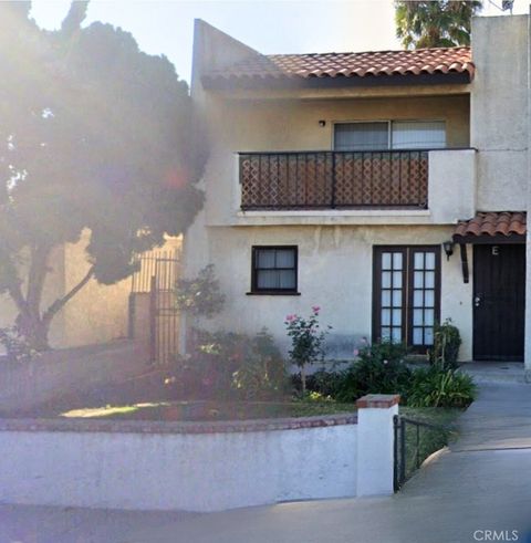 Photo of 17441 Virginia Avenue Ave #E, Bellflower, CA 90706 (MLS # MB25242336)