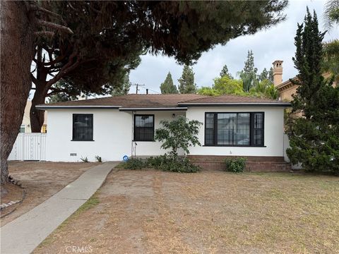 Photo of 7346 Irwingrove DR, Downey, CA 90241 (MLS # IV26106558)