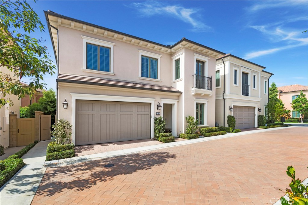 A private oasis in one of Irvine’s premier gated communities, Barcelona, this stunning residence blends refined design with modern functionality. As the largest floor plan in the neighborhood, it represents a rare opportunity to own a home of exceptional scale and quality. Elegant hardwood and stone plank flooring, custom paneled walls, and an abundance of natural light create a warm yet sophisticated atmosphere throughout. The chef’s kitchen is a showpiece, featuring a custom marble backsplash, an expansive walk-in pantry, and generous counter space that opens to the chic-designed family room. The main level includes a guest bedroom and full bath, while the upper level hosts three additional bedrooms including a serene primary suite, a spacious bonus room, and a massive laundry room complete with sink and counter space. Outside, an automatic electric pergola provides adjustable shade, transforming the backyard into a tranquil retreat surrounded by mature landscaping for ultimate privacy. Located in the premier west end of Irvine just minutes from Laguna Beach, the property offers convenient access to world-class dining and shopping at the Irvine Spectrum, major freeways, and the award-winning Irvine Unified School District. The community features a resort-style pool, spa, and clubhouse, and has recently approved a 24-hour security guard gate that will further enhance security and property values. Sophisticated, private, and ideally positioned, this home defines elevated living in one of Southern California’s most desirable communities.