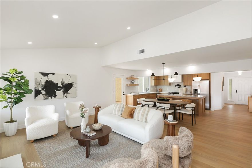 Welcome to this exquisitely remodeled 3-bedroom Rosa model, ideally located on a desirable corner lot in a peaceful 55+ senior community. Step out to your private back patio and enjoy the beautiful mountain views and refreshing breeze—perfect for peaceful mornings or relaxed evenings.



Inside, this home showcases top-end workmanship and attention to detail throughout. Designer touches abound—from the arched hallway and custom paint palette to upgraded cabinetry, gorgeous countertops, and elegant light fixtures. Wide-plank flooring flows seamlessly through the open floorplan, adding warmth and sophistication.



The kitchen is a showstopper with an oversized island offering barstool seating and plenty of cabinetry for storage, making it as functional as it is stylish.



The primary suite is a luxurious retreat featuring dual sinks, an enlarged walk-in shower, beautiful tile flooring, and a spacious walk-in closet. The second bathroom offers a soaking tub and continues the home’s refined aesthetic.



Outdoor living is just as thoughtful, with both a back and side patio offering multiple areas to relax or entertain while taking in the mountain views and cool breeze. Additional features include an epoxied garage floor and high-quality finishes throughout.



Elegant, refined, and truly move-in ready—this home offers the perfect blend of comfort and sophistication in one of the area’s most sought-after 55+ communities. Come see it for yourself and fall in love.
