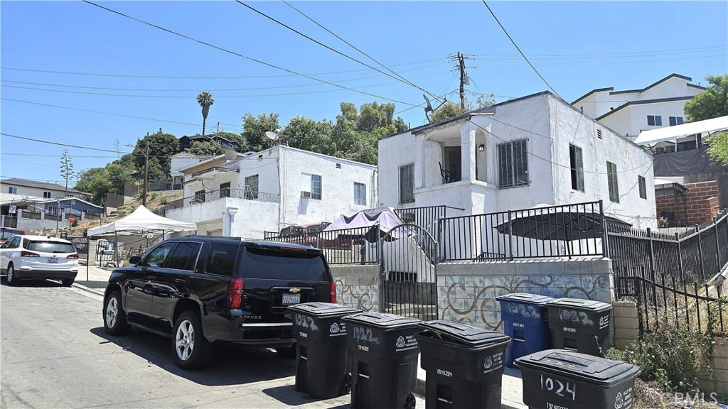 **Triplex at 1022, 1024, 1028 Geraghty Ave**
You live in one unit and rent out the other two. The tenants are responsible for all utilities and have been residing in the property for 15 to 25 years. According to the assessor, the building has a total square footage of 2,112. The property features a generous 7,741 square feet with ample parking.
One of the garages has been converted into a bedroom and a storage room without the necessary permits; these spaces are not included in the living square footage. The owner is currently making some repairs before the close of escrow.
The property is situated in a prime location, within walking distance of City Terrace Park, bus stops, restaurants, grocery stores, and more. The current owner has held the property for nearly 14 years, and the property is low-maintenance.