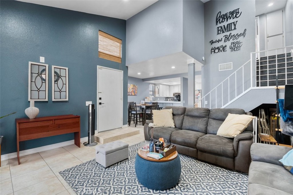 ? Perfect for Los Angeles commuters seeking a lower cost of living and the pride of homeownership! This beautifully updated 2-bedroom, 2.5-bath end-unit townhome offers the perfect blend of comfort, convenience, and style.
Step inside to soaring ceilings, a spacious open-concept living area with luxury vinyl flooring throughout, and a cozy fireplace that flows seamlessly into the private patio with lush greenbelt views. The modern, upgraded bathrooms and well-appointed kitchen add a touch of sophistication, while the premium corner location ensures extra privacy and natural light.
Upstairs, you’ll find two private bedroom suites — the primary featuring a walk-in closet and full bath, and the secondary with its own bath, ideal for guests, roommates, or a home office. A convenient downstairs powder room completes the thoughtful layout.
Enjoy resort-style amenities maintained by the HOA, including a sparkling pool, relaxing spa, beautifully landscaped grounds, plus water and trash service included. The two-car attached garage with direct access makes life even easier.
All this while being close to restaurants, shopping, schools, and freeways — making your commute into Los Angeles more affordable without sacrificing comfort or convenience.