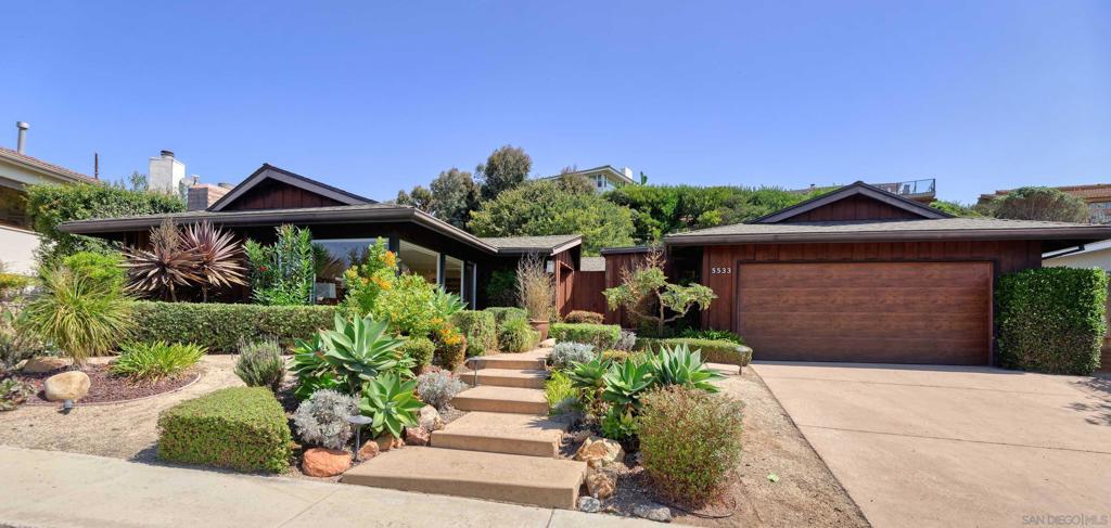 Nestled in one of La Jolla’s most sought-after neighborhoods, this single-level residence offers the perfect blend of comfort, seclusion, and proximity to the beach. The contemporary ranch style home features white-water views, 4 bedrooms, 3 bathrooms, and an office with a bright, open layout and central atrium. The open-concept kitchen boasts professional-grade appliances and granite countertops, flowing seamlessly to the spacious backyard. The 12,500 sf lot is a lush escape, surrounded by mature trees and thoughtfully landscaped with multiple patios and raised garden beds, ideal for entertaining. Just minutes from the beach, shopping, dining, entertainment, and located within the highly regarded Bird Rock Elementary School area, this home offers the best of coastal living in a prime location. Chef's kitchen featuring Sub-Zero refrigerator, Miele dishwasher, two built-in Decor ovens, instant hot water, sleek white custom cabinetry, and a spacious island. Main en-suite bedroom addition boasts large picture windows, spa like bathroom with modern finishes, stone and glass shower, and a large walk-in closet with beautiful built-ins.