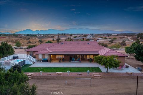 Photo of 12325 Stuveling Street, Oak Hills, CA 92344 (MLS # CV25070315)