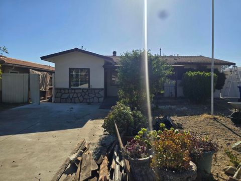 Photo of 9262 Camulos Avenue, Montclair, CA 91763 (MLS # 219150203DA)