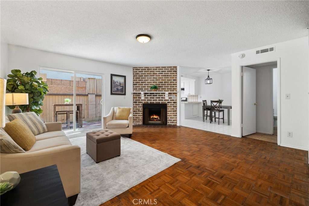 Welcome to 13534 Cordary Ave #14, a spacious and light-filled 3-bedroom, 3-bathroom, 1,732 sq. ft. gated townhome in the highly sought-after Cordary Villas community of Hawthorne. This oversized two-story home features a welcoming entry leading to a large living room with a cozy fireplace, seamlessly flowing into the dining area and kitchen with a breakfast bar, perfect for casual dining or entertaining. Step outside to your private covered patio, ideal for morning coffee or evening relaxation. Upstairs, the expansive primary suite is a true retreat, offering a luxurious private bath, dressing area, huge walk-in closet, and private balcony. Two additional bedrooms share a full bath, and wall-to-wall linen closets provide abundant storage. Additional highlights include an attached 2-car garage with direct access, in-unit washer and dryer, powder room, and gated entry for added security.
Residents enjoy resort-style community amenities, including a sparkling pool, relaxing jacuzzi, and a large grassy barbeque area perfect for gatherings. Located just blocks from Rosecrans Avenue, you’ll be minutes from excellent restaurants, shopping, schools, and all the vibrant attractions the South Bay has to offer. Whether you’re an investor looking for a high-potential opportunity or a homeowner ready to make this home your own, 13534 Cordary Ave #14 offers the perfect blend of comfort, convenience, and lifestyle in the heart of Hawthorne.