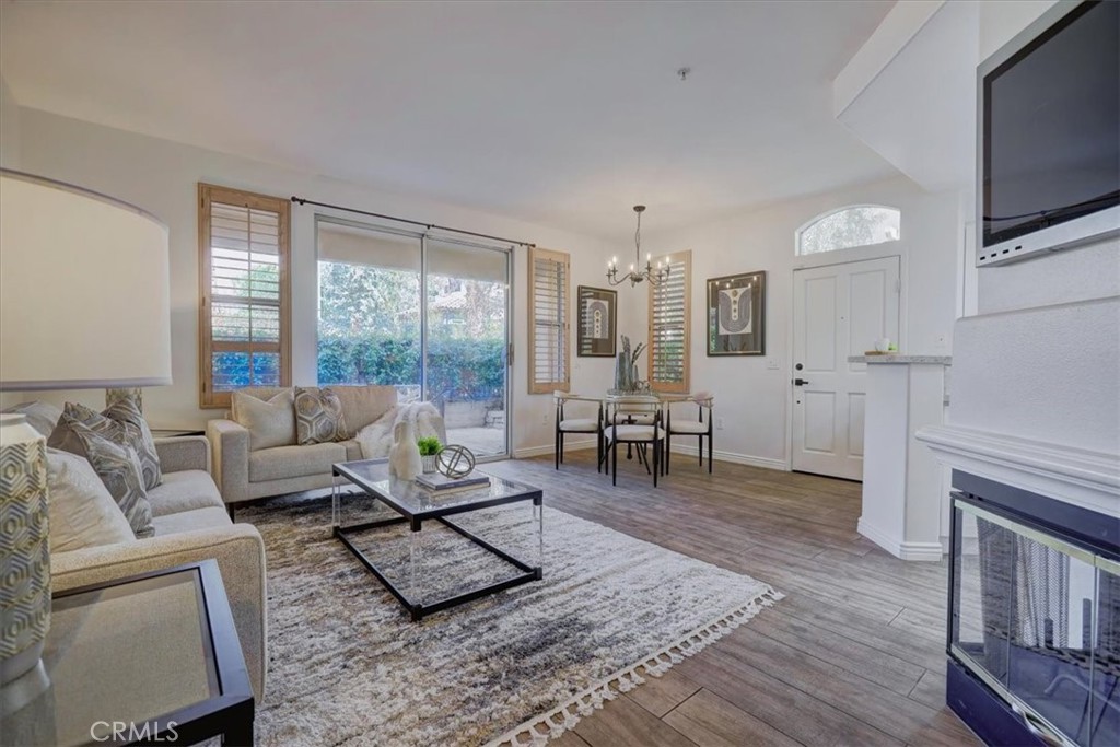 RARELY AVAILABLE single-level end unit in the sought-after Cantada community of Tustin Ranch! This highly upgraded 2-bedroom, 2-bath home offers the perfect blend of modern style and serene privacy. Backing to a lush greenbelt with no neighbors behind, the private patio is an ideal spot to relax and unwind.
Inside, you’ll love the open floor plan with soaring ceilings, abundant natural light, and a cozy fireplace. The fully remodeled kitchen showcases crisp white cabinetry, granite countertops, and stainless steel appliances—perfect for both everyday living and entertaining. The spacious primary suite features a walk-in closet and spa-like soaking tub.
Additional highlights include newer carpet and tile flooring, an upgraded water heater, an interior laundry room with washer and dryer, plus an attached 1-car garage and assigned carport.
Cantada offers resort-style amenities including a sparkling pool, spa, and BBQ area. All this with easy access to Peters Canyon Regional Park, Cedar Grove Park, award-winning schools, shopping, dining, and major freeways.