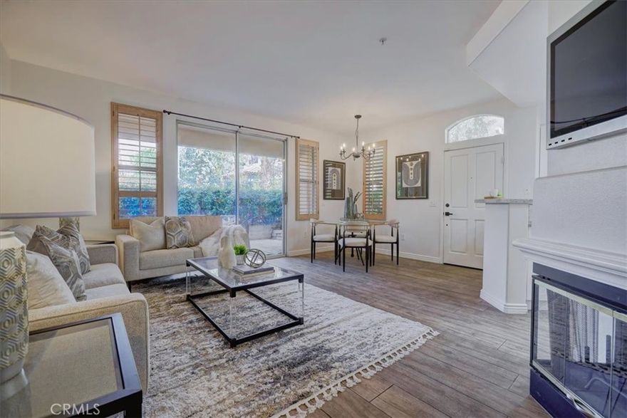RARELY AVAILABLE single-level end unit in the sought-after Cantada community of Tustin Ranch! This highly upgraded 2-bedroom, 2-bath home offers the perfect blend of modern style and serene privacy. Backing to a lush greenbelt with no neighbors behind, the private patio is an ideal spot to relax and unwind.



Inside, you’ll love the open floor plan with soaring ceilings, abundant natural light, and a cozy fireplace. The fully remodeled kitchen showcases crisp white cabinetry, granite countertops, and stainless steel appliances—perfect for both everyday living and entertaining. The spacious primary suite features a walk-in closet and spa-like soaking tub.



Additional highlights include newer carpet and tile flooring, an upgraded water heater, an interior laundry room with washer and dryer, plus an attached 1-car garage and assigned carport.



Cantada offers resort-style amenities including a sparkling pool, spa, and BBQ area. All this with easy access to Peters Canyon Regional Park, Cedar Grove Park, award-winning schools, shopping, dining, and major freeways.