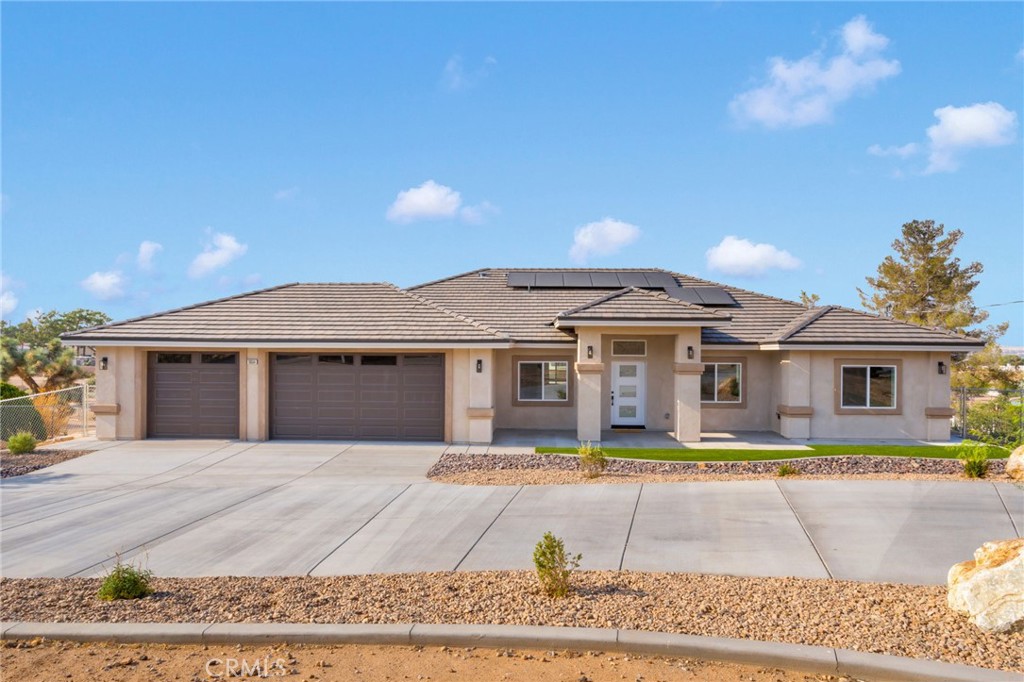 PAID OFF SOLAR!!! Welcome to your dream home on the Mesa in Hesperia! This stunning new construction single-family residence features 4 spacious bedrooms, 3 modern bathrooms, and over 2,150 sq ft of thoughtfully designed living space. Enjoy paid-off solar, soaring high ceilings, and a cozy fireplace that creates the perfect blend of warmth and luxury. The open-concept layout is ideal for entertaining, while the beautifully landscaped front yard and fully fenced backyard offer both curb appeal and privacy. Competitively priced, this home delivers exceptional value in a desirable neighborhood—offering comfort, efficiency, and upscale living in the High Desert.