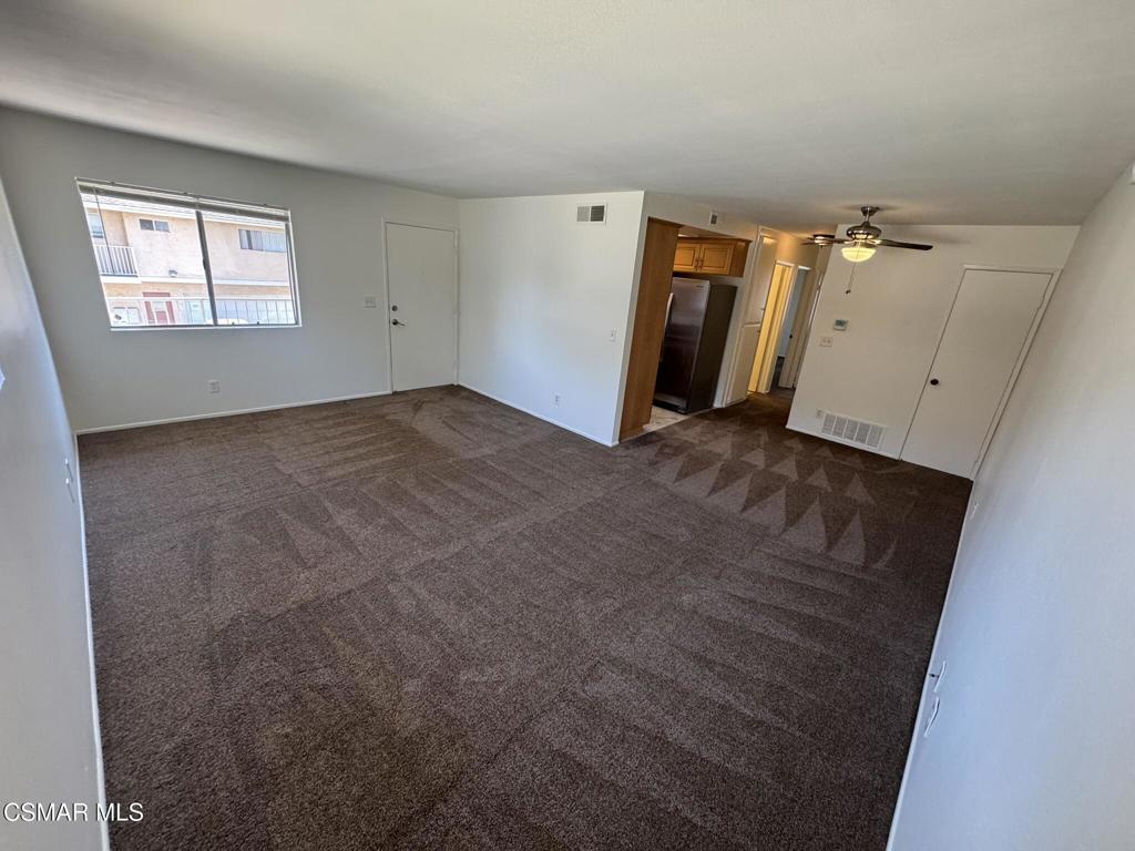 Step into comfort and convenience with this beautifully maintained 2-bedroom, 1-bath upstairs condo nestled in the vibrant heart of Port Hueneme! BRAND NEW CARPET and BRAND NEW PAINT throughout. The cozy kitchen features stainless steel appliances including a refrigerator and brand-new stove. Spacious bathroom with a single vanity and shower/tub combo. The 2 large bedrooms offer comfort and flexibility, with one of the bedrooms having a walk-in closet. Community Laundry Room, Community Pool. 1 parking spot in shared 2 car garage and 1 assigned parking spot in front of 2 car garage. Located just minutes from sun-kissed beaches, scenic parks, and the Channel Islands Harbor, this charming home offers a perfect blend of relaxed coastal vibes and modern amenities.