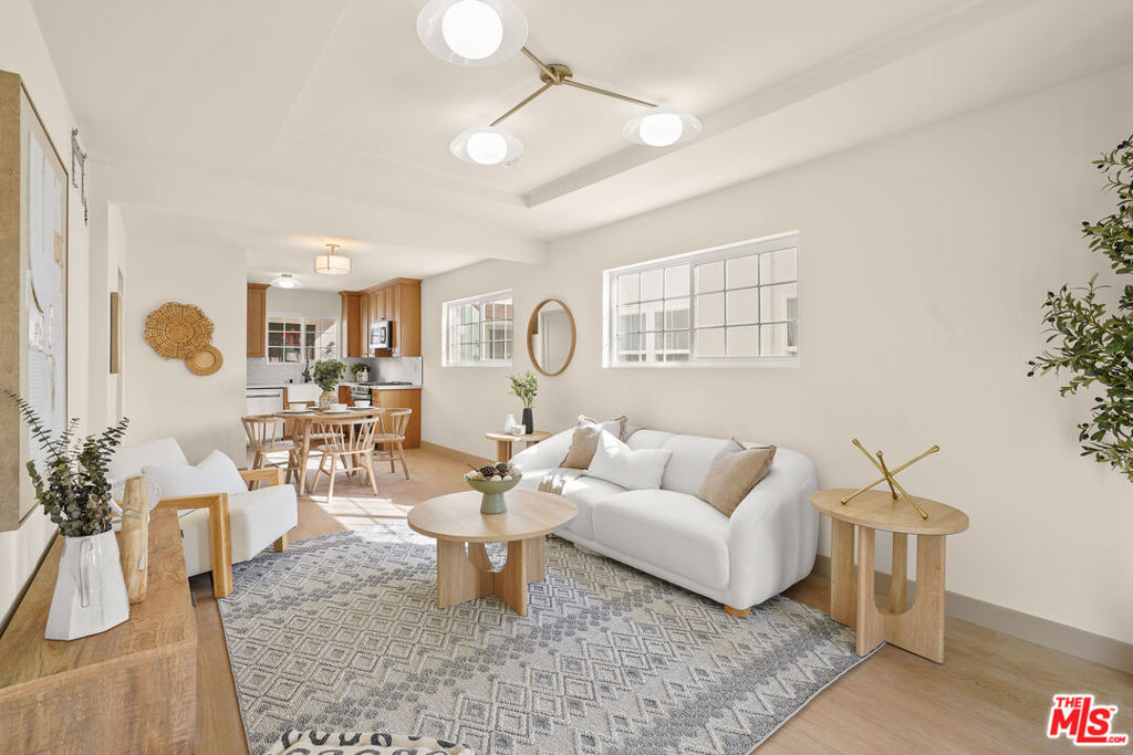 Welcome to your dreamy, vintage-inspired sanctuary in the heart of Highland Park. This stunningly fully detached & remodeled 1927 Spanish bungalow effortlessly combines historic charm and modern flair, making it the ultimate retreat for creatives, young professionals, and trendsetters alike. NO Shared walls and fully detached, just like a single-family home! Step into timeless elegance with 2 spacious bedrooms and airy rooms beaming with natural light. Iconic vintage details and modern touches accentuate the home's irresistible character, including a 3-zone mini-split HVAC, new lighting, dual-pane windows, and all-new electrical and plumbing, elevate daily living. Whip up gourmet meals or brunch delights in the stylish kitchen featuring custom cabinetry, stainless-steel appliances, and a farmhouse sink perfect for hosting intimate gatherings or laid-back weekend hangs. Enjoy lazy afternoons or festive evenings on your expansive private deck with sweeping hillside views. But the magic doesn't stop there; your new home puts you steps away from Highland Park's beloved hotspots. Rosseth, Gloria's, Civil Coffee, Kitchen Mouse, Highly Likely, and Greyhound Bar & Grill are all a few minutes away. With endless trendy bars, eateries, boutiques, and galleries at your fingertips, your Highland Park lifestyle awaits. Don't miss this rare opportunity to own a piece of LA's hippest neighborhood where history, culture, and modern living converge. Welcome home!