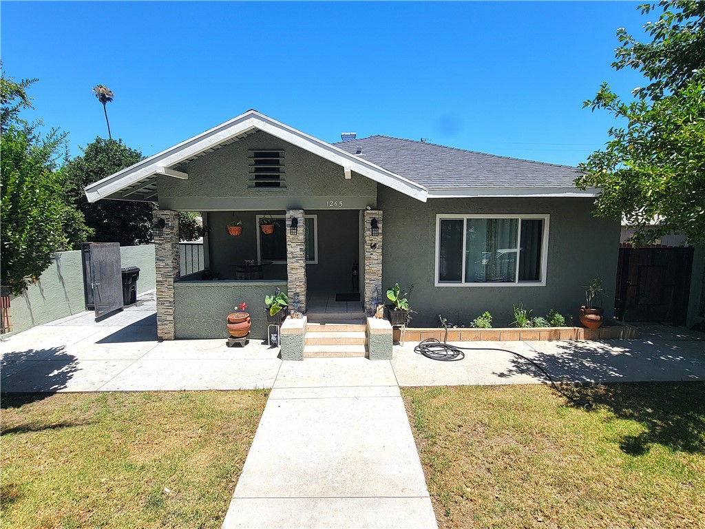 Welcome to your dream home at 1265 W Mission Blvd, Pomona, CA 91766! Step inside to discover a spacious 1,184 sqft interior freshly painted both inside and out. The inviting open layout flows seamlessly from room to room, providing an ideal setting for both relaxation and entertaining. The heart of the home is its stunning kitchen, complete with contemporary finishes that inspire culinary creativity with ample cabinet space and sleek countertops to harmonize function with style.This home features a functional living area with 3 comfortably sized bedrooms. Property has 1 ¾ baths, thoughtfully designed for everyday convenience while ensuring privacy for family and guests alike. Enjoy peace of mind knowing that this charming abode comes with all new plumbing from the main line to the interior. Your comfort is assured year-round with newer Central AC & Heating (about 3 years old), keeping things cool during those warm summer days while providing cozy warmth in winter months. Additionally, enjoy the convenience of in-unit laundry facilities, making chores a breeze. With a generous 5,775 sqft lot, the spacious patio is perfect for hosting summer barbecues or simply unwinding with a good book. Don't miss the opportunity to make this delightful property your new home!