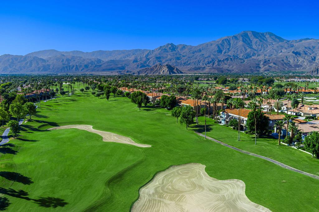 Welcome to 55296 Laurel Valley, a three bedroom end unit condo located on the 8th fairway of the prestigious Jack Nicklaus Tournament course in PGA West! Inside you'll find a bright and airy living space with gorgeous fairway views. This beautiful condo is the perfect blended style for everyday living. The bedrooms are generously sized, and perfect for family and friends. Step outside to your private patio and take in the golf course scenery a perfect spot for morning coffee or evening gathering with friends. Whether as a full-time residence, vacation home, or investment opportunity, this condo captures the best of resort-style living in La Quinta! Close to hiking, biking, golf, tennis, shopping and more!