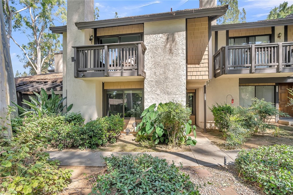 Like a walk through a forest. This Unique Townhome boasts a beautiful view of a parklike setting. Complete with a stream and a pond. Lush landscape, rolling lawns and mature trees. Just a short walk to Canyon Crest Towne Center or a short bike ride to UCR and Sycamore Canyon Park. Easy freeway access. The family room enjoys a fireplace and connects to the formal dining room. The kitchen has new granite counter tops with new stainless sinks and faucets. The kitchen has a large nook and connects to the oversized custom sliding doors leading to a large private patio. The large Master bedroom has a patio that overlooks the park and a master bath that has double sinks with a dressing table and mirrored closet doors. Upgraded ceiling fans and lighting throughout.