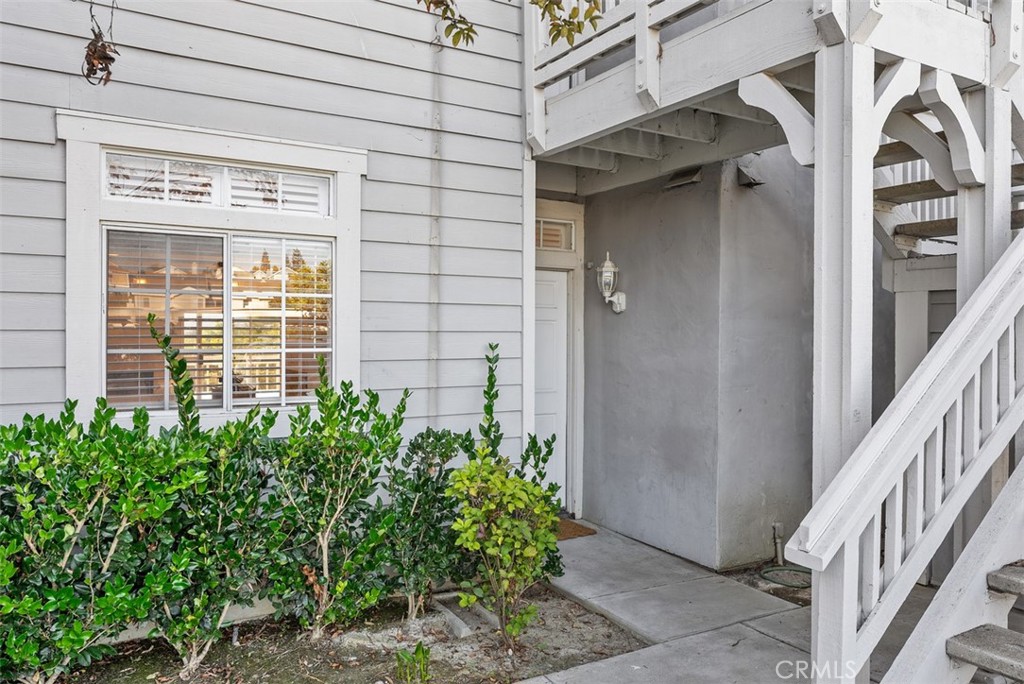 SINGLE LEVEL 2 BEDROOM, 2 BATHROOM CONDO WITH SUNSET VIEWS IN BEACON HILL. Kitchen recently refreshed with new cabinet doors and freshly painted and with granite counter tops and includes a refrigerator. Large, spacious living room with fireplace and slider to patio with views. Primary bedroom opens to private patio and has a bathroom with dual sinks. Inside laundry with washer and dryer included. Less than 5 minutes away from the beach, downtown Dana Point, Monarch Beach Club, Blue Ribbon schools and 10 minutes to Laguna Beach. HOA amenities include 3 pools, including a lap pool, 6 lighted tennis courts, and the surrounding parks. One covered parking spot with multiple parking spots within the community for guests or a second car. New AC/heating unit and hardwood floors. Rent includes water and trash.