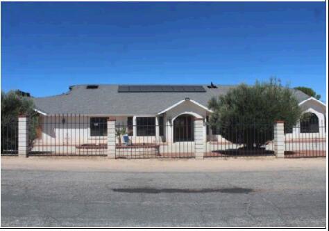 The current homeowner's loss can be your gain.Amazing opportunity full of potential. Located just one block from the Apple Valley Golf Course in the very desirable and sought after Desert Knolls area of Apple Valley, this house is now ready to be made beautiful again and customized by you to exactly how you want it. Before the fire the homeowners had just completed a remodel and the house was move-in ready with new windows, roof, solar tubes, HVAC, solar on roof, new LVP floors (that may clean up nicely as they're pretty much indestructible), new cabinets galore in extra large dining room, breakfast nook, and laundry room (that look like they can be cleaned up, but ''may'' need painting). An unfortunate fire in the garage has destroyed the garage and some of the attic; so the garage, trusses and roof will need to be replaced. Some of the inside walls ''may'' need to be taken down to the studs due to ''possible'' water damage from the fire hoses. It will be up to your contractor to evaluate the exact repair needs of the house.Engineering plans, awesome blueprints for 2900 sq ft 4 bed/3 bath floor plan, and just issued Town of Apple Valley permits for repairing this home are already completed and paid for. This property is a perfect sized 3/4 acre (big enough for privacy, not too big to maintain) that is a corner property that has a very rare city street light on the corner to help with security. This property is completely fenced and crossed fenced to separate the pool area from other yard areas. There are two remote controlled power gates on the front circular driveway. The fencing around the backyard pool area is a beautiful 6' tall slump-stone block wall for swimming privacy. If you have dogs, there's another backyard area that is perfect for them via a doggie door from the pool access bathroom. The immediate backyard is a private oasis with a pool, faux lawn around pool area, gazebo with fan and Edison lights, pergola, and covered patio area. There is an enclosed patio that can be used to store pool toys and towels, or it can possibly be used as 400 more sq ft of living space by adding a mini-split AC/heating unit. This house has 2x6 exterior walls with nearly new, beautiful black windows. There is gorgeous custom solid oak woodwork throughout (including a wall of built-in solid oak bookshelves that includes a roll-top desk in the middle) that can be cleaned and kept, or painted/replaced to your taste.Pics from Before & After fire