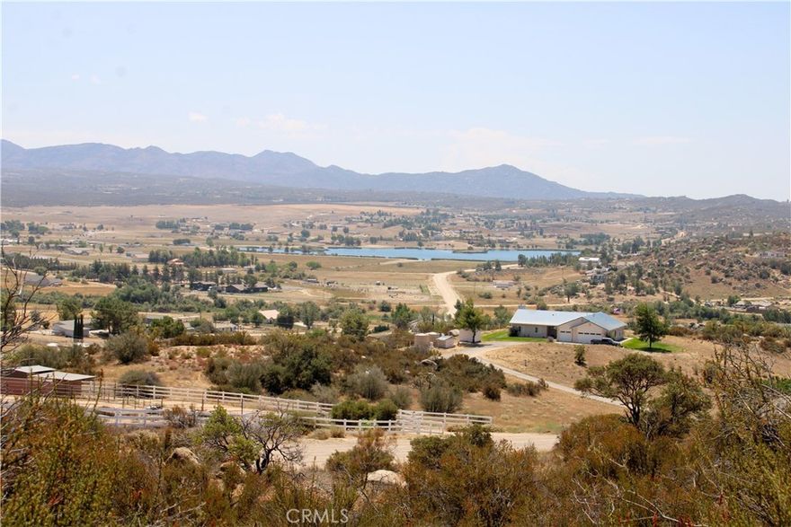 2.87 Acre Lot in Lake Riverside Estates Community in Aguanga. Usable gently sloping hillside lot with wonderful views of mountains, Lake Riverside and the valley. Great location in the community. Come develop your very own rural homesite with plenty of room for horses, gardens, trees etc. Lake Riverside Estates is located at 3500 Foot elevation in the foothills between Temecula and Palm Desert. Enjoy mild 4 season weather. 30 minute drive to Temecula. Beautiful community! HOA amenities include stocked lake, picnic areas and playground, community equestrian center, private airstrip, maintained roads, security and gated community.