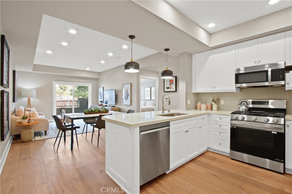 Plan C - This single-level floorplan has two bedrooms and two bathrooms with approximately 1071?sq?ft of living space. The open-concept living and dining area extends seamlessly to a private balcony, perfect for indoor-outdoor entertaining. Interior finishes include wide-plank hardwood flooring throughout, quartz counters, full tile backsplash, and a premium stainless-steel LG appliance package (French-door fridge, built-in microwave, gas range with AirFry, dishwasher). Bedrooms feature generous closets, and the primary bath includes a glass-enclosed shower, quartz counters, designer selected porcelain tile, and stainless-steel accents.
La Sevilla is a brand-new upscale collection of 75 single-level condominiums that combine comfort, simplicity, and modern living. Each home offers hardwood flooring throughout, a private balcony, and premium Stainless Steel LG appliance package. Residents enjoy a fitness center, remote-work lounge, community room with full kitchen and pool table, plus a BBQ area with firepit.
Nestled on the Palos Verdes Peninsula, La Sevilla offers the tranquility of a high-end neighborhood alongside true walkability. Just steps away are Peninsula Center shops, the public library, grocery stores, coffee shops, and local restaurants—no freeway needed.