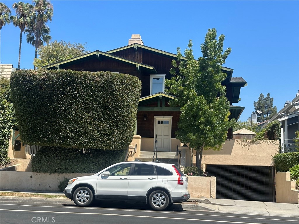 Welcome to this beautiful front unit craftsman style townhouse in a 4 unit gated community. Updated kitchen with newer appliances. Spacious step down living room with fireplace and built-in book shelves. 2 suites upstairs with a fireplace in the master suite. Central air. Bright and airy with skylight upstairs. Private patio. Two car attached garage in gated area. Laundry in garage. Prime Pasadena location close to freeway, gold line, shopping and restaurants.