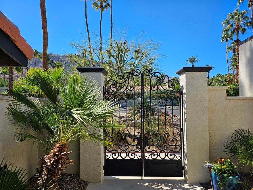 ****Classic 1970's Charmer with Spectacular Mountain Views!!!  Beautifully maintained truly special 3 bedroom, 3 bath home combining timeless architecture with a COMFY modern vibe. WONDERFULLY updated kitchen expansive Living-room, dining-room as well as family-room that offers a Spacious light-filled interior opening seamlessly to an ENTERTAINERS backyard featuring a SPARKLING salt water pool, expansive patio and multiple sitting areas/fire pit to take in those breathtaking MOUNTAIN VIEWS. Designed for effortless indoor/outdoor living, this desert retreat offers style, privacy, and sophistication.  Perfectly situated high up in the Magnesia Falls Cove-where tranquility meets STUNNING scenery. No HOA.