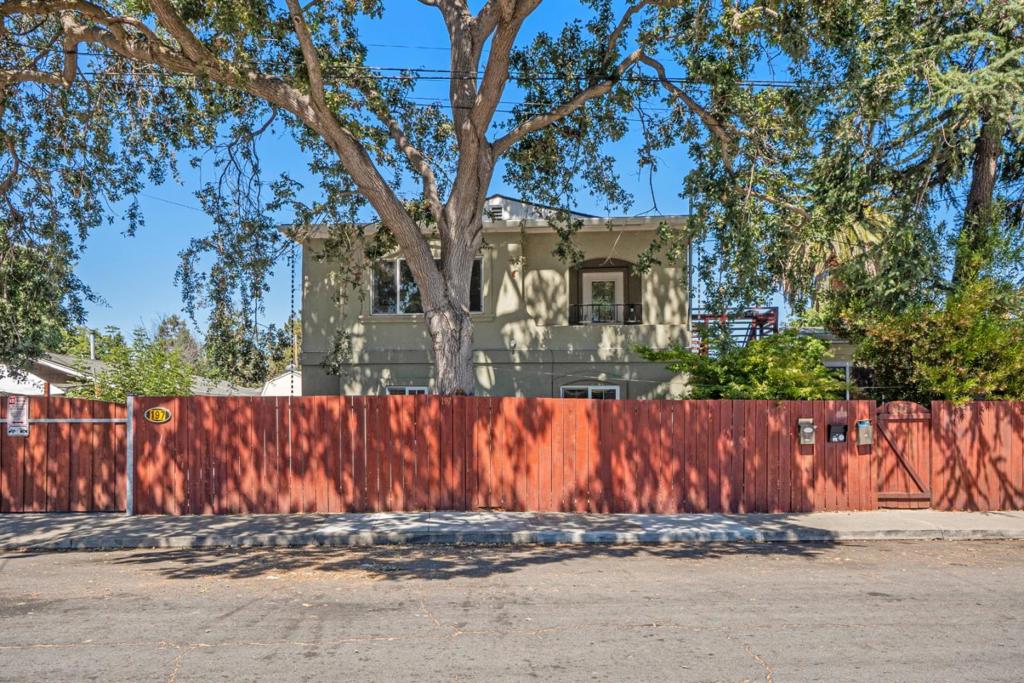 A rare opportunity to own three extensively renovated units, each with tranquil shared yard space, parking, in-unit laundry, and air conditioning. Major upgrades include a reinforced foundation during remodeling and a new roof on the main building in 2025. The landscaped grounds feature fruit trees, garden beds, and mature trees. Great investment opportunity or perfectly positioned for multi-generational living. 197 Nottingham (2BD/2BA): Taken down to the studs and fully remodeled from 2010- 2022 with a modern open floor plan, office nook, dining area, and living room opening to a private patio. Includes a guest bedroom and primary suite with ensuite. 197B Nottingham (2BD/1BA): Spacious upstairs unit remodeled in stages from 2014-2022, filled with natural light, ample storage, and stylish updates. 199 Nottingham ADU (1BD/1BA): Built in 2020 with full kitchen, private driveway, porch, and access to a shared yard. Set behind a six-foot enclosed fence, the property offers a serene retreat. Moments from shopping, dining, and commuter routes to San Francisco or Silicon Valley. All units are tenant-occupied with strong rental income ideal for an owner-occupant, as a low-maintenance investment in a prime location, or for multi-generational living.