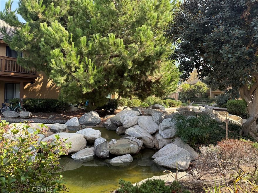 Welcome to the tranquil Lakes Community in Irvine! This beautifully maintained ground-level unit offers a bright, open layout with peaceful views of streams and a waterfall. Features include an upgraded kitchen and bathroom, in-unit washer and dryer, and refrigerator — all included. Convenient assigned parking directly in front of the home provides easy access. Enjoy the community’s serene setting while being just minutes from top-rated schools, shopping, dining, walking trails, and the Irvine Spectrum. Don’t miss this opportunity to enjoy a relaxed lifestyle in one of Irvine’s most desirable neighborhoods.