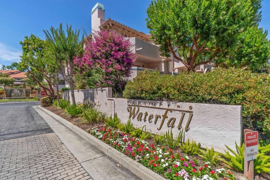 Improved price! This exquisite 2-bedroom, 2-bathroom condo, spanning 1,154 square feet, blends modern elegance with unparalleled convenience. The chef-inspired kitchen dazzles with stainless steel appliances, including cooktop, ovens, dishwasher, and refrigerator, paired with sleek quartz countertops and a stylish breakfast bar. The living room features a charming fireplace and rich hardwood flooring to create a warm, inviting ambiance. Spacious bedrooms feature walk-in closets for ample storage, while the beautifully tiled bathrooms offer both shower and tub options for ultimate comfort. Enjoy the ease of in-unit laundry with a washer and dryer, energy-efficient double-pane windows, and radiant electric heating. The community elevates your lifestyle with a sparkling pool, in-ground spa/hot tub, and a charming pool house for relaxation. Located in the top-rated Cupertino Union School District, with access to C. B. Eaton Elementary, Sam H. Lawson Middle, and Cupertino High School, this home also includes a 2-car tandem garage, with garbage and water utilities covered by the HOA. With seamless access to Highways 85 and 280,  Apple Headquarters, De Anza College, Whole Foods, and much more, this move-in-ready condo in one of Cupertino's most sought-after neighborhoods is a rare find.