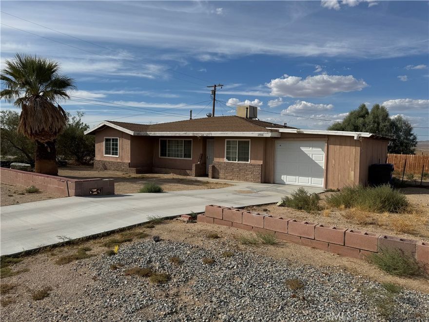 Stop the car!!! This is a beautiful home in the desired area of Barstow.  This is a corner lot that gives you increased size and access to your home.  As you enter the home, you are greeted by a large living room perfect for entertaining.  Proceed to your right and you will enter your updated kitchen with plenty of cabinet space.  Passing through the kitchen and you will arrive at the guest bathroom.  Right next to the guest bathroom is rooms number one and two.  Both rooms are nicely sized.  Proceed to the west side of the home and you will enter the spacious primary bedroom.  Next to the primary bedroom is restroom number two and the fourth bedroom.  This home has an attached one car garage and one outbuild for extra storage.  This wont last long so call for your showing appointment today.