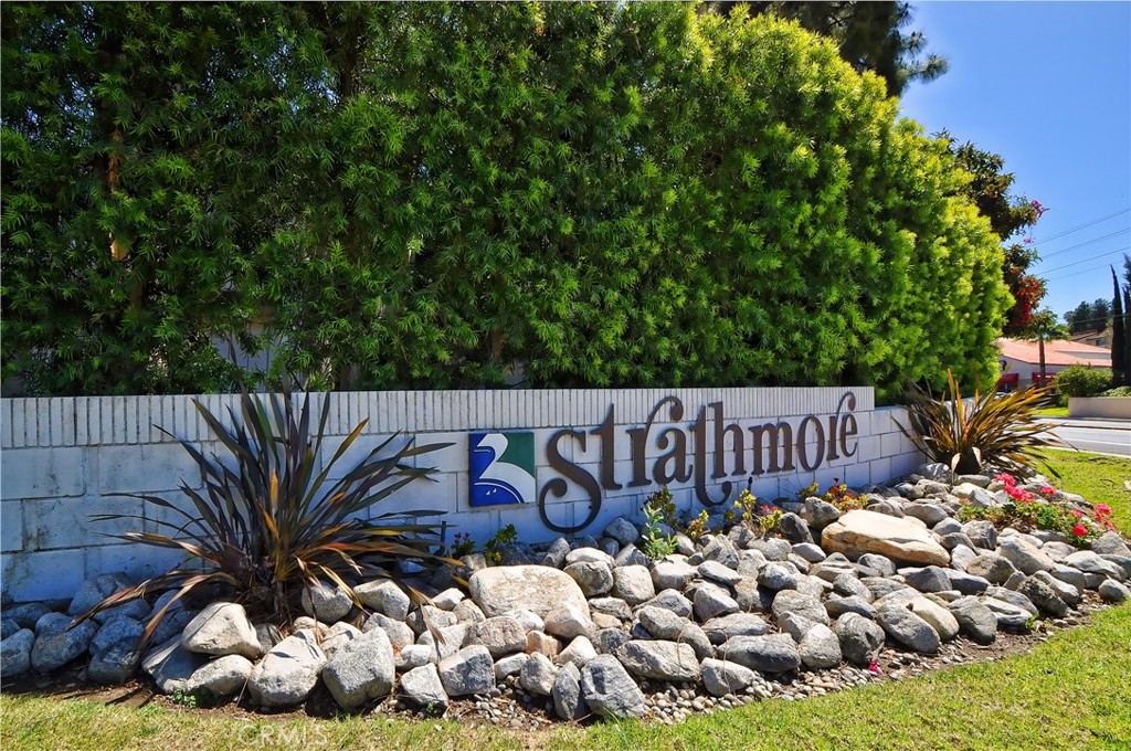Welcome to Strathmore! A highly sought-after community with the option to attend the award-winning Palos Verdes School District. This light and bright townhouse is tucked away in a private setting, just two units from the end, and offers 1,274 sq.ft. of living space with 3 bedrooms and 1.5 bathrooms. Upstairs, you’ll find all three bedrooms, each with vertical blinds. The primary suite features a spacious walk-in closet with access from the one full bathroom that the 2 other bedrooms can access from the hallway. Downstairs, the entryway opens to a generous sized living room and dining area with neutral carpeting and a large picture window that fills this spacious room with natural light. A convenient guest powder room is also located on this level.
The comfortable, eat-in kitchen offers tiled countertops, built-in wood cabinetry, a ceiling fan, wood-style plank flooring, a freestanding stove, and a dishwasher. Sliding glass doors lead out to a fully landscaped private patio with direct access to the oversized two-car garage, complete with laundry hookups, water heater, and additional storage space. Additional features include central heating and air conditioning. The HOA provides residents with a sparkling pool, community center, and includes trash pickup service. The Strathmore townhomes are centrally located near schools, banks, gas stations, parks, shopping, Trader Joe’s, Sprouts, several pet stores, movie theatre and just minutes away from the 110 freeway.