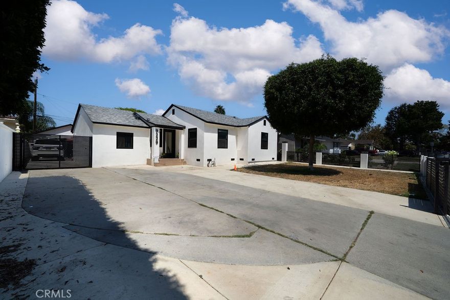 Magnificently Reimagined North Downey Home with Desirable Upgrades, ADU, and Spacious 7,567 sq. ft. lot! Ideally nestled in a highly sought-after neighborhood just moments from shopping centers and other daily conveniences, this incredibly unique property affords an amazing opportunity for savvy homeowners and seasoned investors. Freshly painted with modern colors, the exterior captivates with modern horizontal fencings, tidy landscaping, classic smooth stucco finish, newer front gate, and an oversized paved driveway. Step inside the 3Bed/2Bath, 1,400+ sq. ft. MAIN HOUSE to discover an organically flowing floorplan, fresh neutral paint, overflowing natural light, gorgeous faux-wood wide-plank laminate floors, recessed lighting, elegant dining area, and a spacious living room. Perfectly appointed for easy meal preparations, the gourmet kitchen dazzles with stainless-steel appliances, quartz countertops, white shaker cabinets, undermount stainless-steel sink, gas stove, built-in microwave, dishwasher, and sleek hardware. Enjoy the relaxation found in the primary bedroom, which has plenty of closet space and an attached end suite boasting custom tilework, shower/tub combo, and a storage vanity. Two extra bedrooms are generously sized with dedicated closets and may also satisfy lifestyle-specific flex space needs. Finally, the attached, ADU offers multigenerational options and/or additional income opportunities for offsetting the mortgage. Fabulously refinished, the fashionable 1Bed/1Bath, 300 sq. ft. ADU enchants with mini-split heating/air, sizeable bedroom, full kitchen (no dishwasher), and a chic bathroom boasting a step-in shower. Additional considerations include a detached two-car garage, laundry area, NEW electrical box, NEW rewired electrical, NEW heating unit and A/C, NEW roof, ceiling fans, near major freeways, restaurants, banks, entertainment, parks, schools, and much more! Start living your best life, and get all the advantages of a remodeled, investment-friendly home. SCHEDULE YOUR PRIVATE TOUR TODAY!
