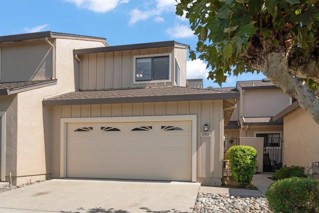 Welcome to this updated 2-bedroom, 2.5 bathroom residence located in the Ridgemark Golf Club area of Hollister. The home boasts two large Primary Suites, both with it's own private bathroom. The kitchen is well-equipped with modern amenities, including tile countertops, a dishwasher, garbage disposal, an electric oven, and a refrigerator, ensuring a delightful cooking experience. The home features a mix of carpet, tile, and wood flooring, providing both style and comfort. Enjoy both patios. The front patio is gated for privacy and the rear patio opens up to the common area. Home and Pest inspections have been completed. Home is clean and ready to enjoy. Relax and unwind in the separate family room, which includes a fireplace, creating a cozy atmosphere for gatherings. For your convenience, the home includes central AC and central forced air gas heating, ensuring year-round comfort. The in-home laundry facilities come with a washer and dryer, adding ease to your lifestyle. Additional highlights include a spacious 2-car garage with a Level 2 (240 volts) electric vehicle hookup. Existing refrigerator, washer and dryer included with the sale. Don't miss the opportunity to make this well-appointed home yours today!