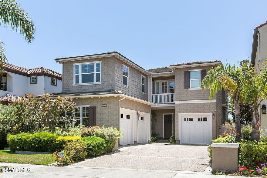 Stunning Seabridge waterfront home with a 45' dock! Situated on a coveted south-facing lot on guard-gated Coral Island, this property allows for resort-style living with panoramic views of the channel and breathtaking sunsets. Enter to a light-n-bright open floorplan, the largest in Seabridge, that immediately draws your eye to the fabulous backyard: in-ground spa, 2 firepits, and ample patio space with pavers to entertain day or night. The gourmet kitchen has huge center island with countertop seating, gorgeous granite countertops, Wolf stainless steel appliances (including a double oven and 6-burner cooktop), Subzero refrigerator, breakfast nook with views, and butler's pantry with beverage fridge and walk-in pantry. The adjacent family room has cozy fireplace, hardwood floors, and views to the rear yard. Cathedral ceilings and French doors grace the formal dining area, which opens to a sophisticated living room with fireplace. A powder bathroom and oversized laundry room with sink complete the downstairs. Dramatic wrought-iron staircase leads to the primary suite with rotunda entrance and unobstructed views of the harbor from the large balcony or cozy sitting area. The primary bathroom is spacious with its dual vanities with granite counters, shower stall, sunken tub, stone floors, and large walk-in closet. Three spacious guest bedrooms are all ensuite(!) and have walk-in closets. Neutral paint, hardwood floors, Berber carpet, recessed lighting, and indoor & outdoor surround sound make this home move-in ready. Driveway with pavers and pristine 3-car garage with motorized ceiling rack. Take the private, backyard stairwell to your adjacent dock - just bring your boat, Duffy, SUPs, or kayaks to enjoy the waterways that lead to the Channel Islands! The Seabridge lifestyle offers an escape from reality plus its exclusive 24-hour guard gate, luxurious landscaping, waterfront walking paths, clubhouse, fitness center, pool & spa, and the convenience of nearby fine dining, services, and shopping via the pedestrian bridge that connects Windshore Way to Seabridge Lane. Paradise awaits!