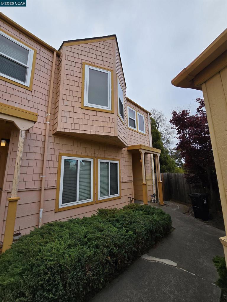 This beautiful two-story, two-bedroom, one-bath townhouse-style unit is available now. The unit features tile flooring in the living room with a small dining area, an electric glass cooktop stove, a refrigerator, a built-in microwave, and a dishwasher. There is also extra storage throughout, including a large coat closet and two storage closets, as well as large glass mirrored closets in the bedrooms. Upstairs consists of 2 bedrooms with wall-to-wall carpets, a coin-operated laundry room on site, a private back patio area, an oversized private garage. Located just minutes from El Cerrito Plaza, shops, restaurants, schools, Ranch 99, Costco, and more. Easy commute to San Rafael, Berkeley, El Cerrito, Hercules, Rodeo, Oakland, San Pablo, El Sobrante, Albany, Corte Madera, San Francisco, and UC Berkeley (studious students welcome). Quick access to transportation: El Cerrito Plaza and El Cerrito Del Norte BART stations, Highways 80 and 580, and Richmond Ferry to SF. The owner pays for the water, garbage, and landscaping in the front area. $ 2,495 Rent / $ 2,495 Deposit / $ 4,900 Total Move-In Cost