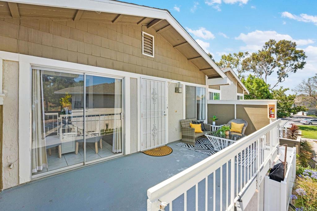 Fully upgraded single level end unit in the highly desirable Whelan Ranch community. Bright, spacious, and move-in ready. This 3 bedroom 2 bath home lives like a private retreat with no one above, direct access to an attached 2 car garage, and an oversized private deck perfect for morning coffee or evening wine. Inside, enjoy vaulted ceilings, recessed lighting, new luxury vinyl plank flooring, and plush carpet in the bedrooms. The kitchen has been fully remodeled with custom cabinetry, quartz countertops, stainless steel appliances, and sleek modern hardware. Both bathrooms feature new vanities, updated lighting, and reglazed tub and shower enclosures. The primary suite offers a walk-in closet and ensuite bath while the in-unit laundry adds everyday convenience. Community amenities include a pool, spa, playground, and walking trails. Just minutes from the beach, shopping, dining, and Camp Pendleton.