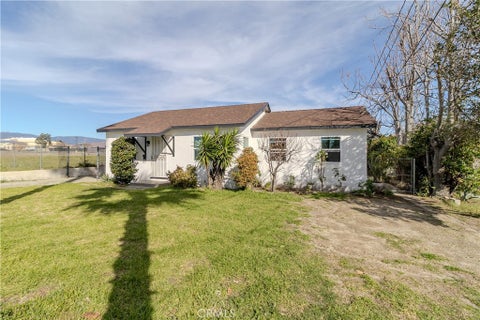 Photo of 9023 Olive St, Fontana, CA 92335 (MLS # OC26201808)