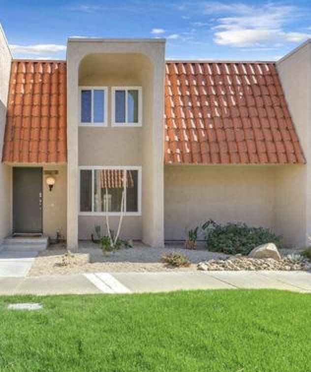 This beautifully updated 3-bedroom, 1.5-bathroom gem is located in a gated community in Palm Springs, offering 1,344 sq ft of sleek, modern living with recessed lighting, air conditioning, and a scenic backdrop of the Palm Springs hills. The open-concept main level includes a spacious living and dining area, a stylish kitchen with quartz countertops, stainless steel appliances, ample storage, and a convenient powder room. Upstairs, the primary suite features an en-suite bath, alongside two additional bedrooms and a full bathroom. Enjoy the ease of an in-unit washer and dryer, a private garden patio ideal for outdoor dining or relaxation, and direct access to two covered parking spaces with additional storage. The community offers two sparkling pools, relaxing spas, beautifully landscaped grounds, and low HOA fees—all just minutes from downtown. This move-in ready home is the perfect Palm Springs retreat!